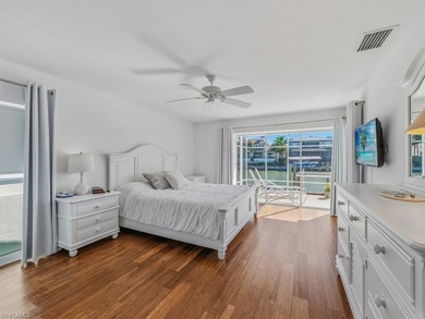 This home truly checks all the boxes! Set on a triple-wide canal - photo 17