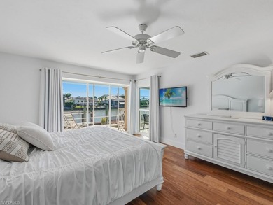 This home truly checks all the boxes! Set on a triple-wide canal - photo 18