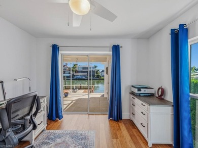 This home truly checks all the boxes! Set on a triple-wide canal - photo 25