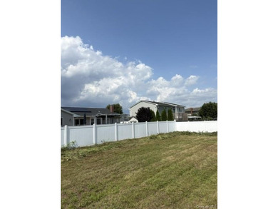 This compact, fully fenced lot offers a secure and practical - photo 1