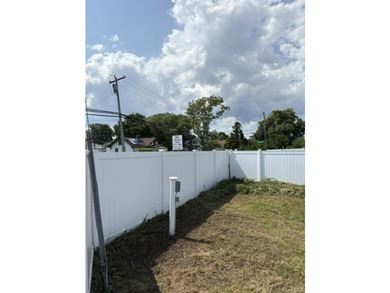 This compact, fully fenced lot offers a secure and practical - photo 2