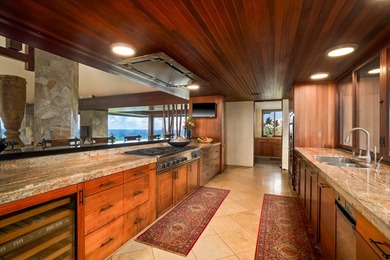 Set on 6.87 acres above Anini Reef on Kaua'i's North Shore, this - photo 10