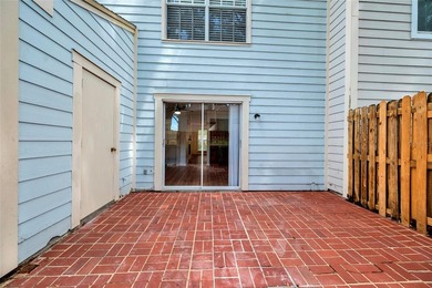 This centrally located townhome has been refreshed for modern - photo 22