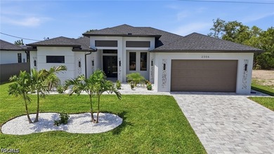 Introducing a SPECTACULAR WATERFRONT New Construction Home in SW - photo 2