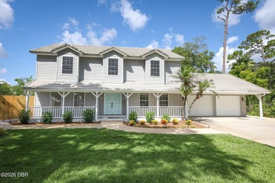 Welcome to this beautifully renovated 5-bedroom, 2.5-bath pool - photo 1