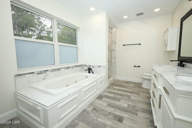 Welcome to this beautifully renovated 5-bedroom, 2.5-bath pool - photo 8