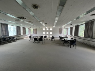 This three-story limestone office building totals approximately