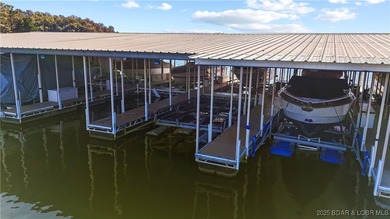 Experience the ultimate Lake of the Ozarks escape in this highly