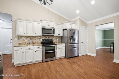 Step into this beautifully renovated home where modern updates - photo 12