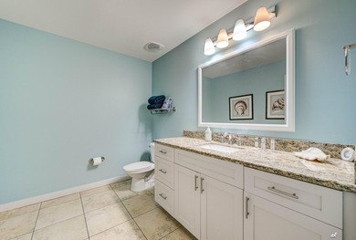 Step into coastal living at its finest with this spacious - photo 15