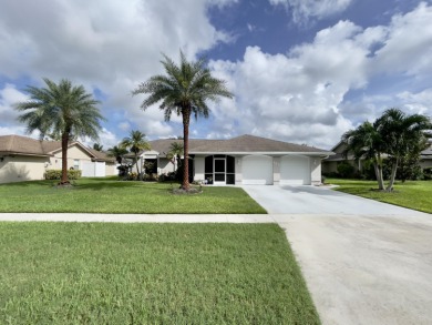 Lake Home For Sale in Royal Palm Beach, Florida