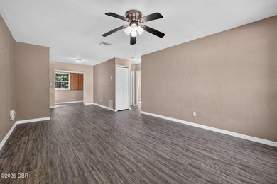 Move right into this charming concrete block home featuring a - photo 3