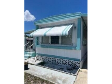 Charming manufactured home in Leisure Village, a well-maintained - photo 2