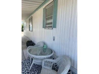 Charming manufactured home in Leisure Village, a well-maintained - photo 3