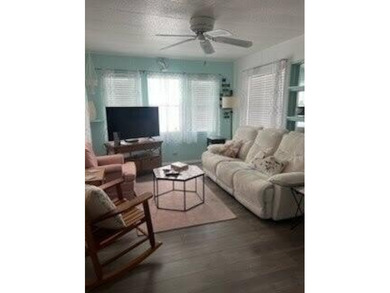 Charming manufactured home in Leisure Village, a well-maintained - photo 4