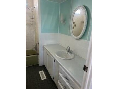 Charming manufactured home in Leisure Village, a well-maintained - photo 9