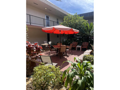 Welcome to this charming 2-bedroom, 2-bathroom condo located on - photo 2