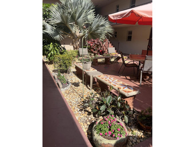 Welcome to this charming 2-bedroom, 2-bathroom condo located on - photo 3