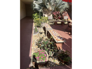 Welcome to this charming 2-bedroom, 2-bathroom condo located on - photo 4