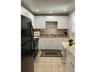 Welcome to this charming 2-bedroom, 2-bathroom condo located on - photo 5