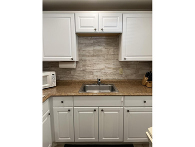 Welcome to this charming 2-bedroom, 2-bathroom condo located on - photo 6