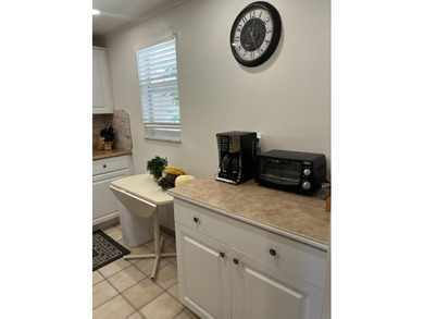 Welcome to this charming 2-bedroom, 2-bathroom condo located on - photo 7
