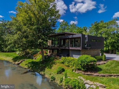 This home is a lifestyle. Set on the banks of the West Branch - photo 1