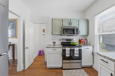 Welcome home to this charming 3-bedroom, 1.5-bath home featuring - photo 6