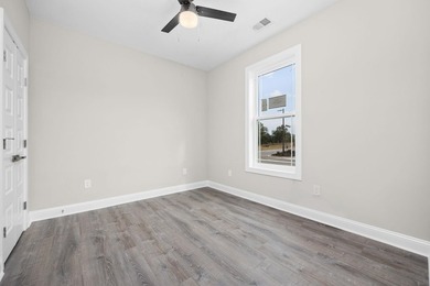 Indulge in coastal luxury with this stunning 3-bedroom - photo 13