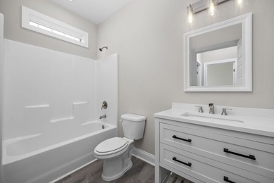 Indulge in coastal luxury with this stunning 3-bedroom - photo 16