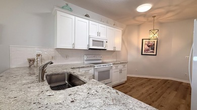 RARE Waterfront Home with a 2-car garage in the gated community - photo 7