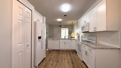 RARE Waterfront Home with a 2-car garage in the gated community - photo 8