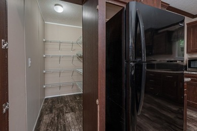 Enjoy easy country living nestled among the trees on 1.5 wooded - photo 12
