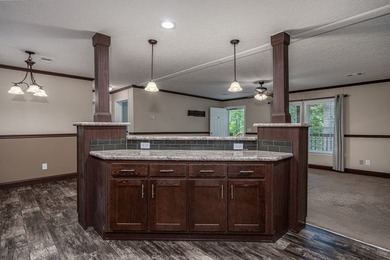 Enjoy easy country living nestled among the trees on 1.5 wooded - photo 13