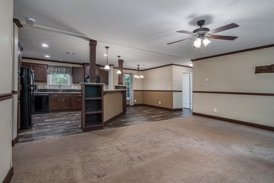 Enjoy easy country living nestled among the trees on 1.5 wooded - photo 14