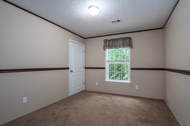 Enjoy easy country living nestled among the trees on 1.5 wooded - photo 20