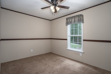 Enjoy easy country living nestled among the trees on 1.5 wooded - photo 24