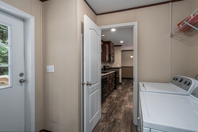 Enjoy easy country living nestled among the trees on 1.5 wooded - photo 26