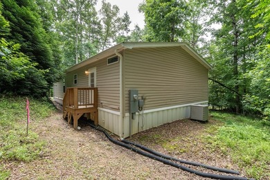 Enjoy easy country living nestled among the trees on 1.5 wooded - photo 27