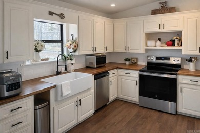 Cozy Hot Springs Village home featuring a rustic look in a quiet - photo 2