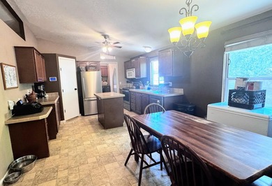 This is a 3 bedroom 2 full bath manufactured home on land - photo 16
