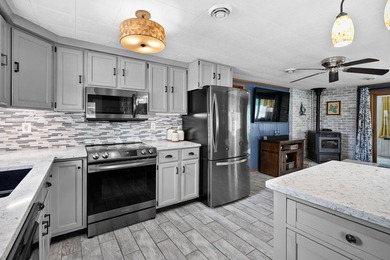 Enjoy the best of Gun Lake living with this charming 2-bedroom - photo 6