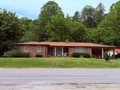 PRIME LOCATION defines this 3-bedroom, 2-bathroom brick ranch - photo 2