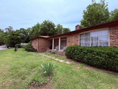 PRIME LOCATION defines this 3-bedroom, 2-bathroom brick ranch - photo 5