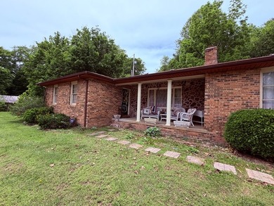 PRIME LOCATION defines this 3-bedroom, 2-bathroom brick ranch - photo 6