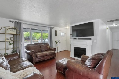 Ready to enjoy this perfectly manicured front yard & beautiful