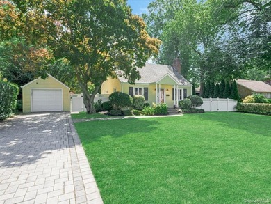 Immaculately maintained and full of timeless charm, this lovely - photo 1
