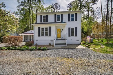 Discover effortless living in Urbanna Creek Farms with this - photo 1