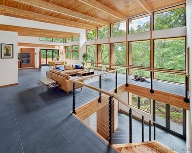 This exquisite Frank Lloyd Wright Usonian-inspired lakefront - photo 11