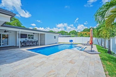 This beautifully maintained 4/2 pool home offers just under 2 - photo 9